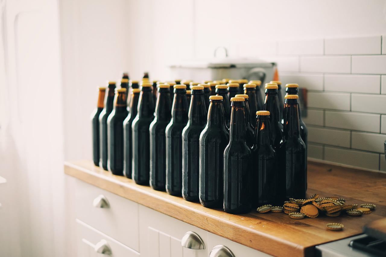 bottles, beer bottles, bottle caps-1866945.jpg